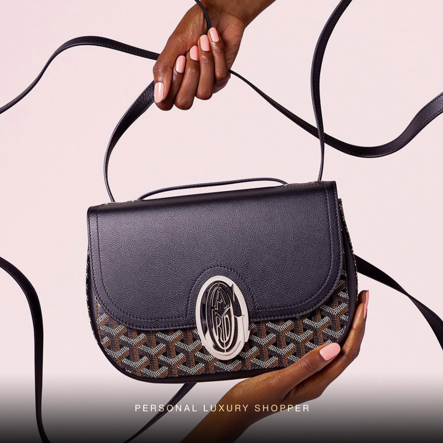 Blauvax monogram hardware on a luxury handbag