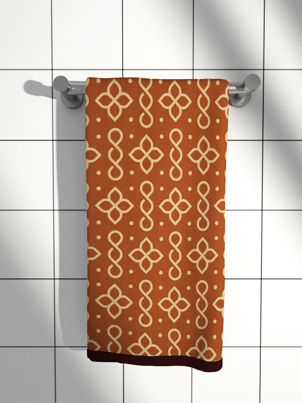 Branded bath towel on the rail